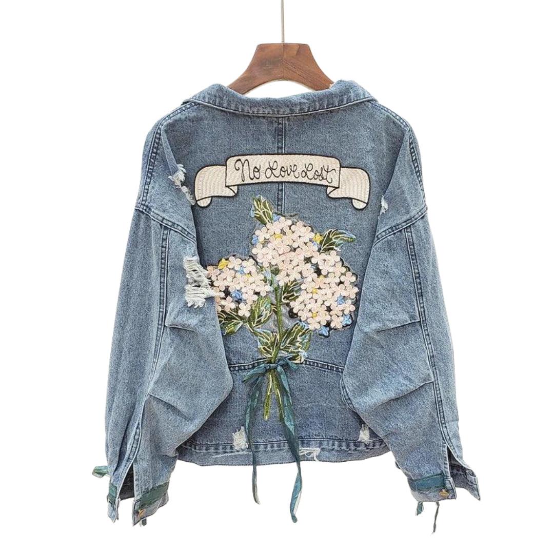 veste-en-jean-avec-dessin-dans-le-dos-femme