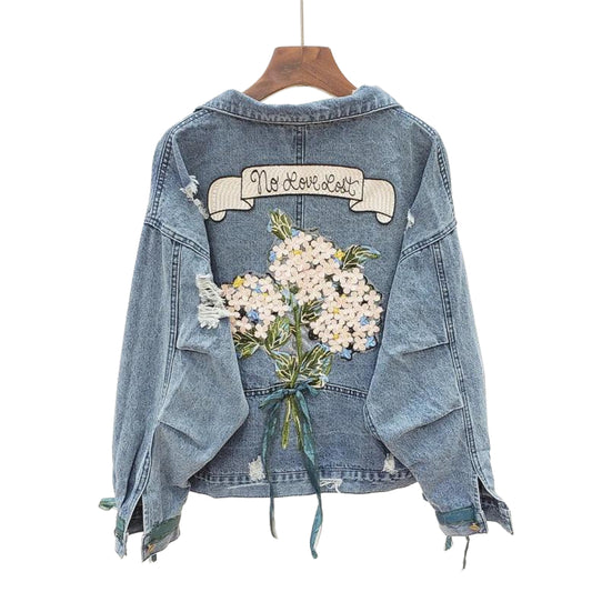 veste-en-jean-avec-dessin-dans-le-dos-femme